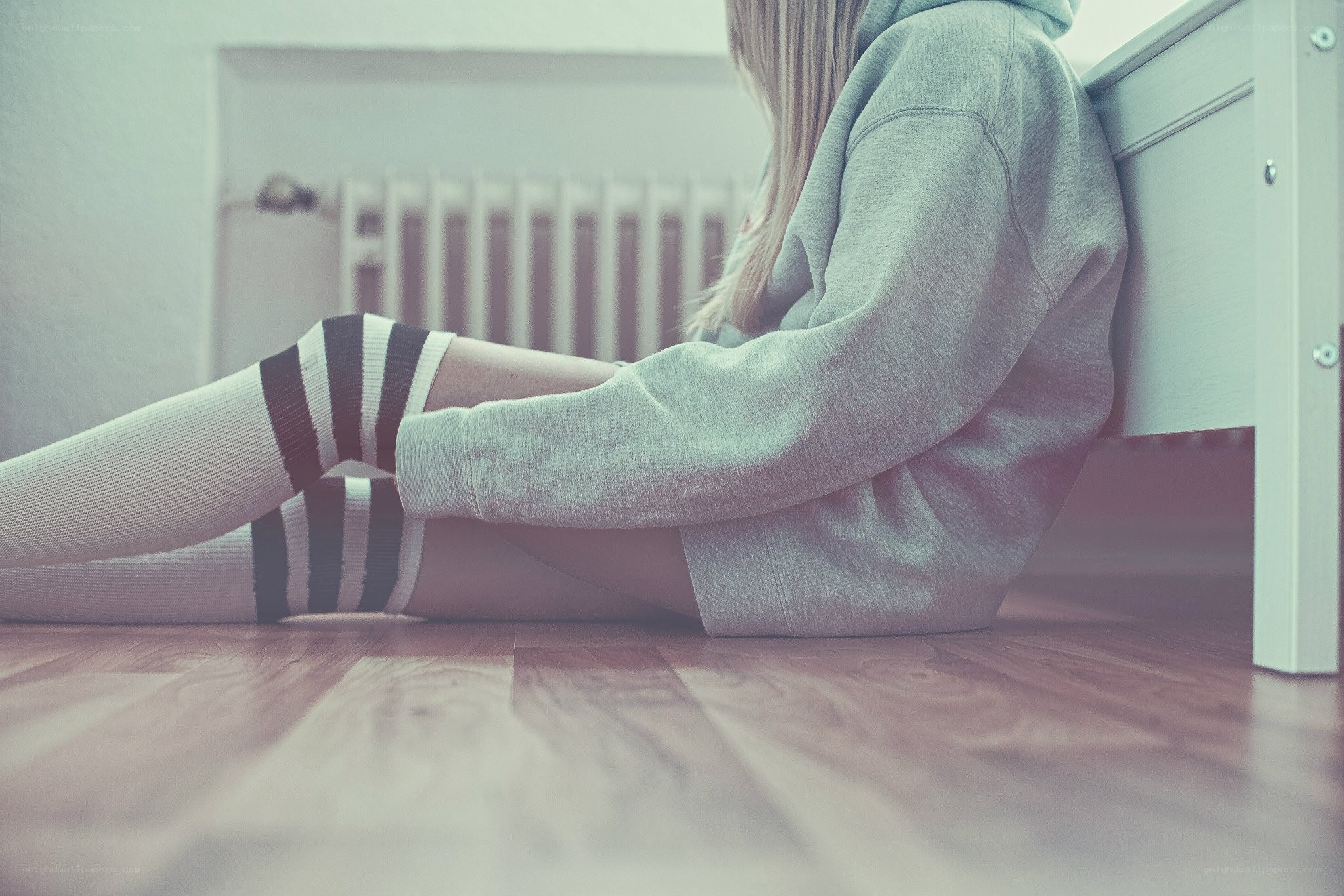 person sitting on floor