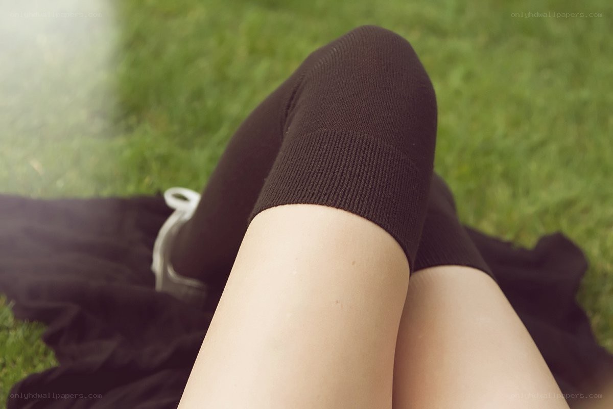 person sitting on grass