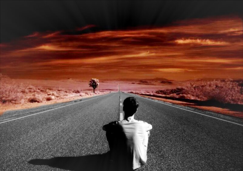 Person Sitting on Road — Black