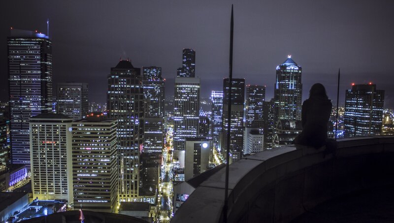Person Sitting on Rooftop — Black, Calm