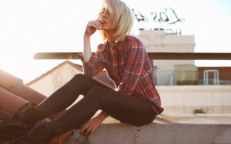 Person Sitting on Rooftop — Red, Contemplative