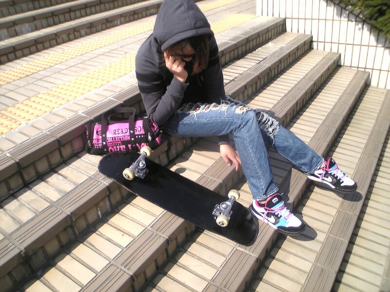 Person Sitting on Stairs — Black