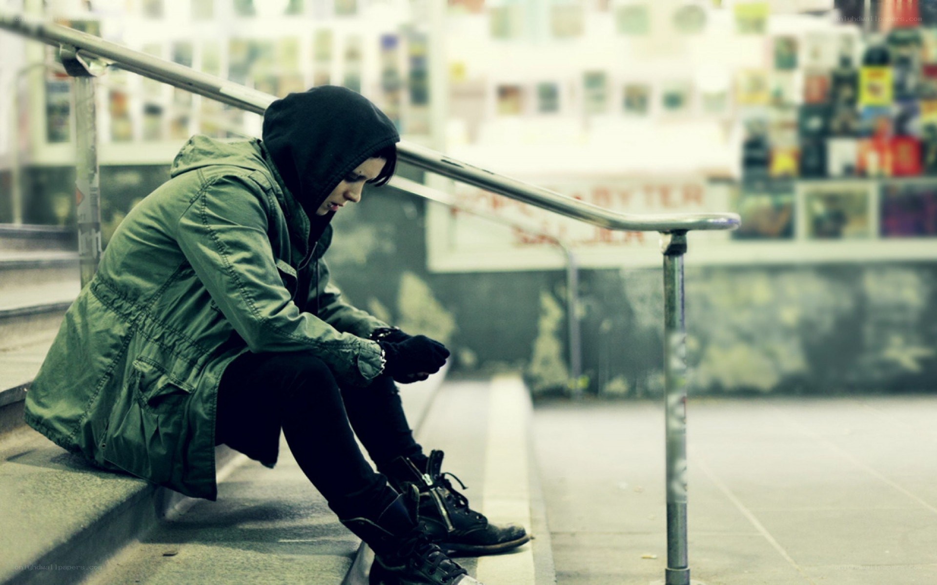 person sitting on stairs