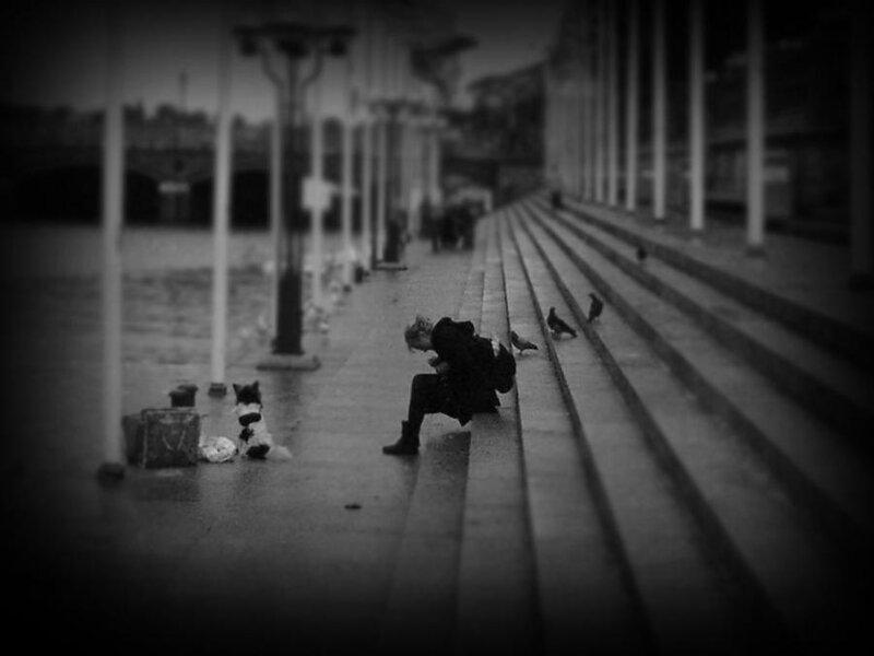 Person Sitting on Steps — Black