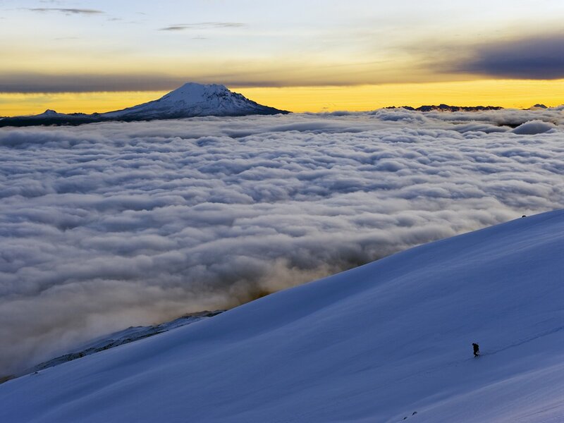 Person Skiing on Mountain — White, Serene