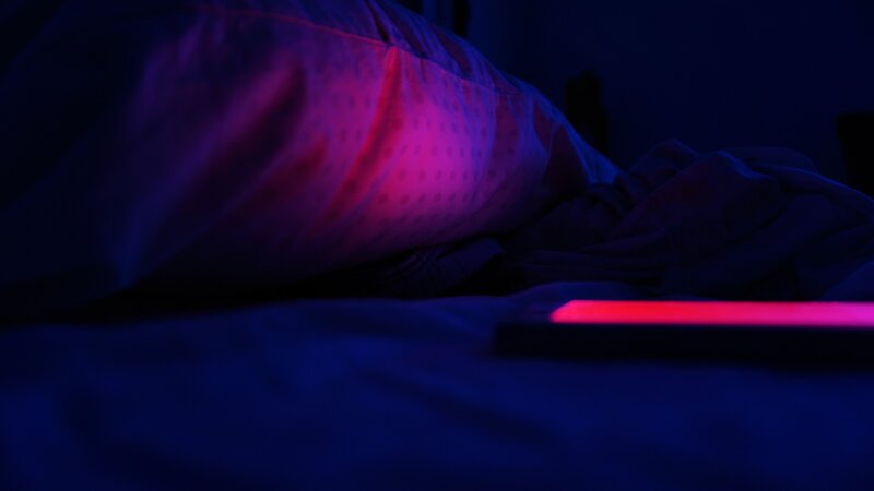 Person Sleeping in Bed — Blue