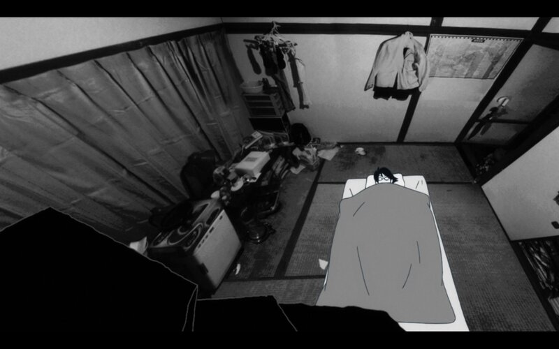 person sleeping in cluttered room