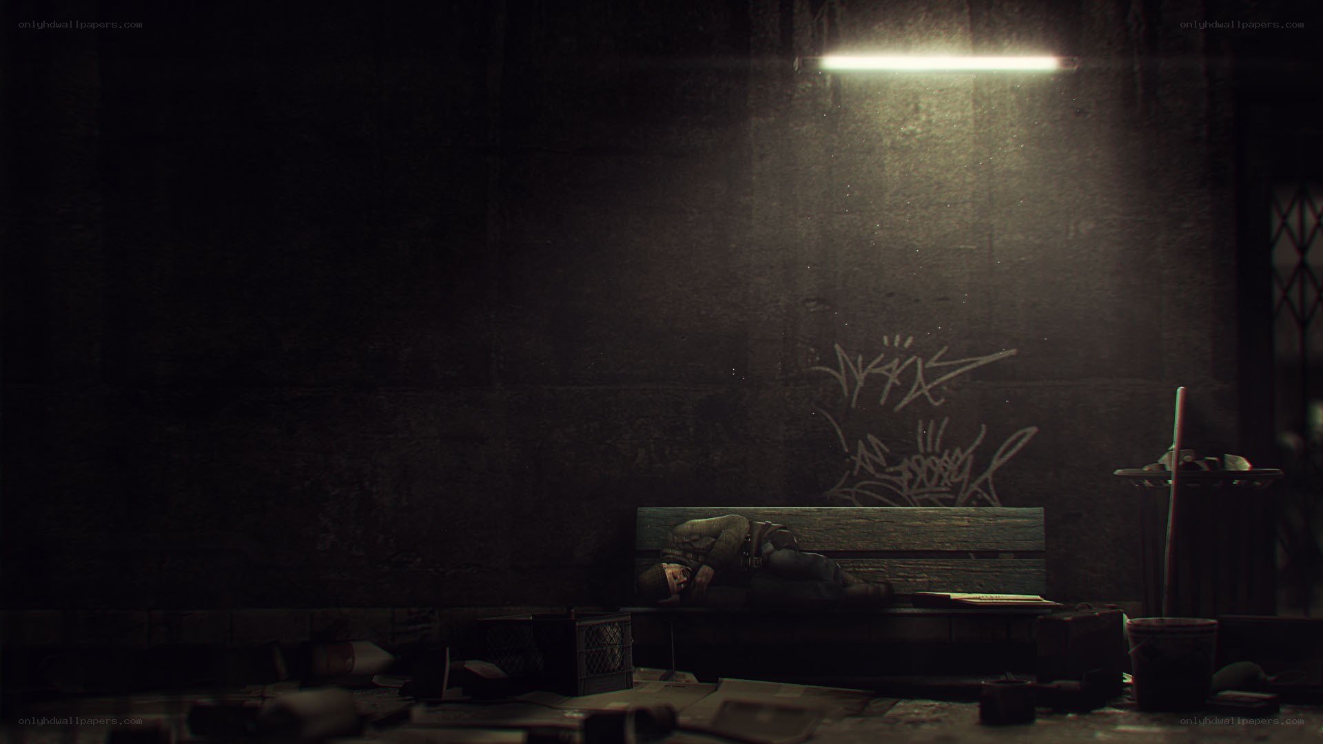 person sleeping on a bench