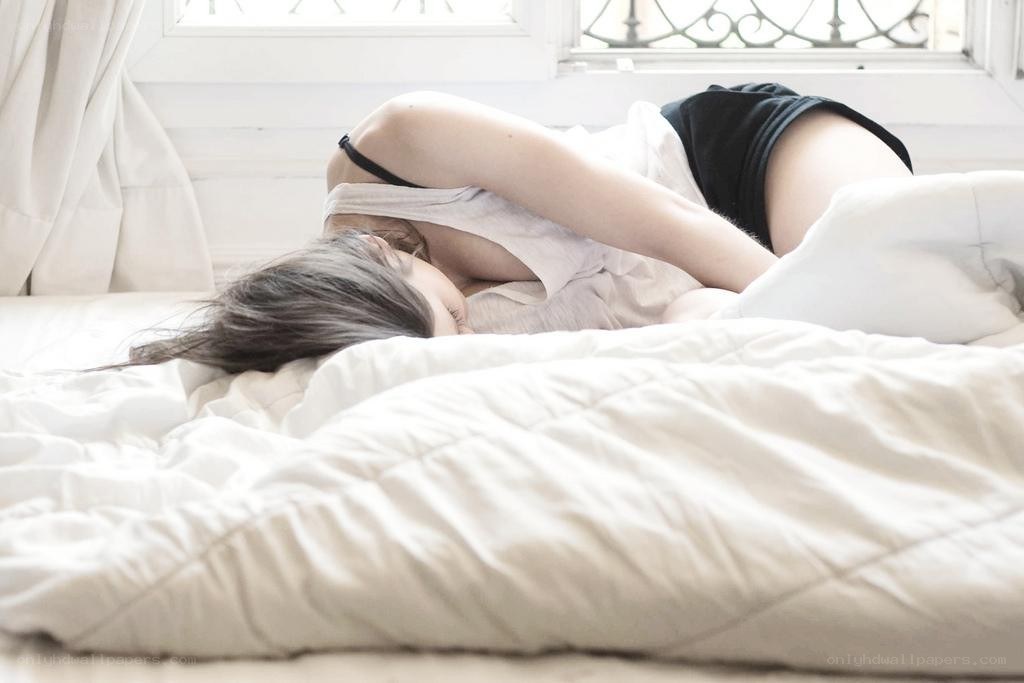 person sleeping on bed