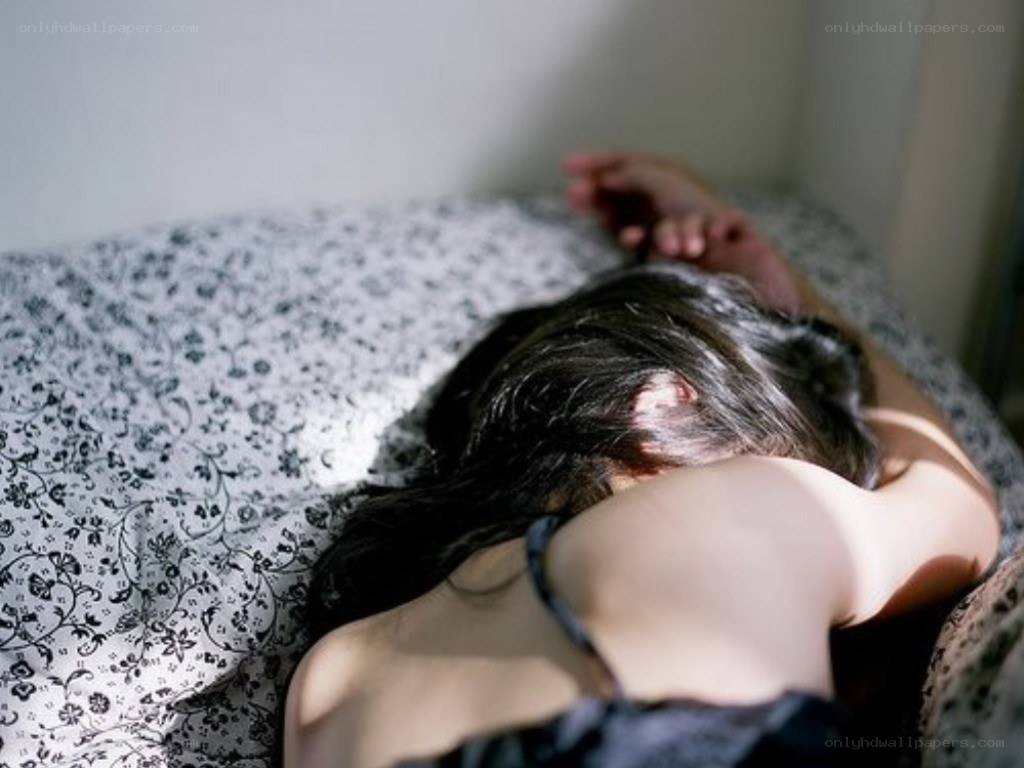 person sleeping on bed