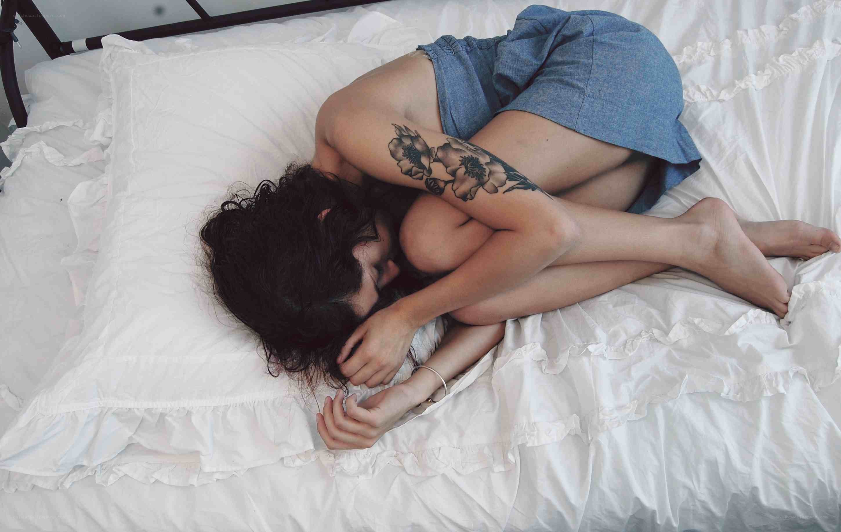 person sleeping on bed