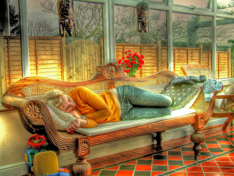 Person Sleeping on Chaise Lounge