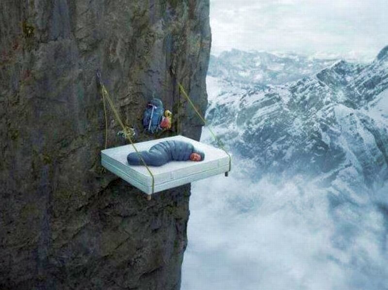 Person Sleeping on Cliff