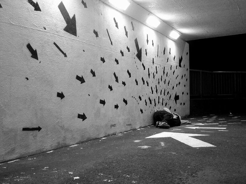 Person Sleeping on Ground — Black