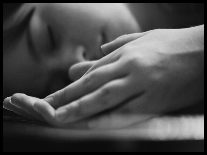 Person Sleeping on Hand