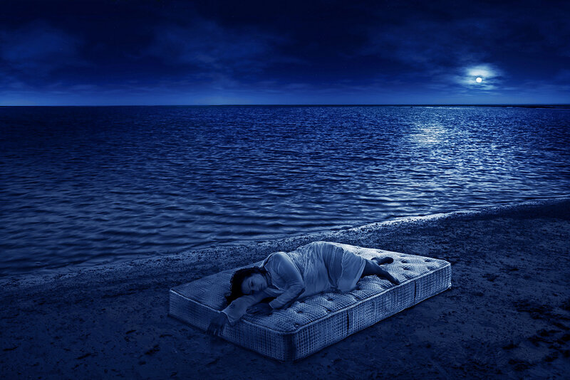 Person Sleeping on Mattress