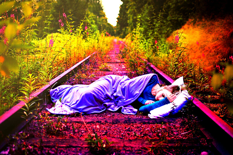 Person Sleeping on Tracks — Purple