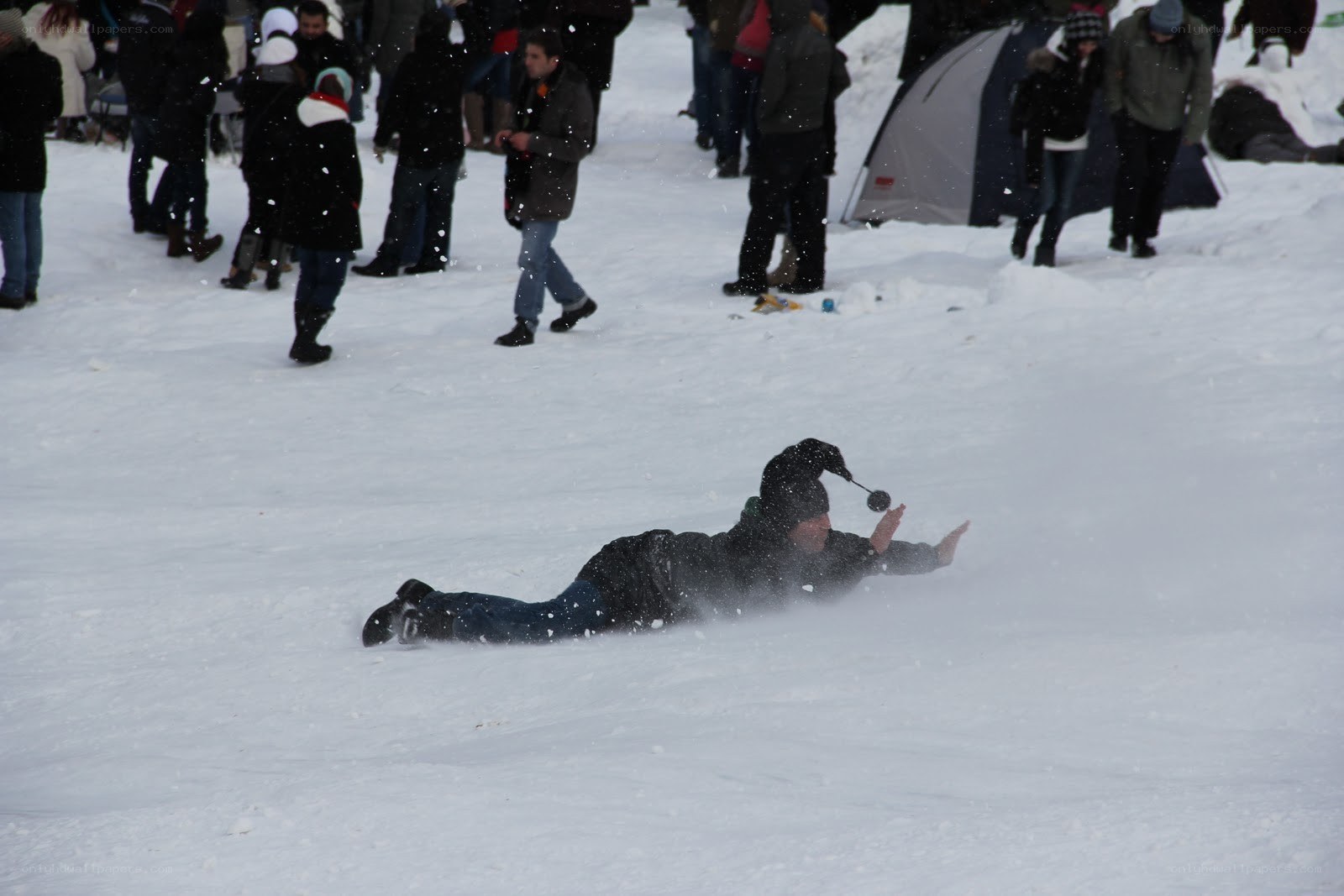 Person sliding in the snow