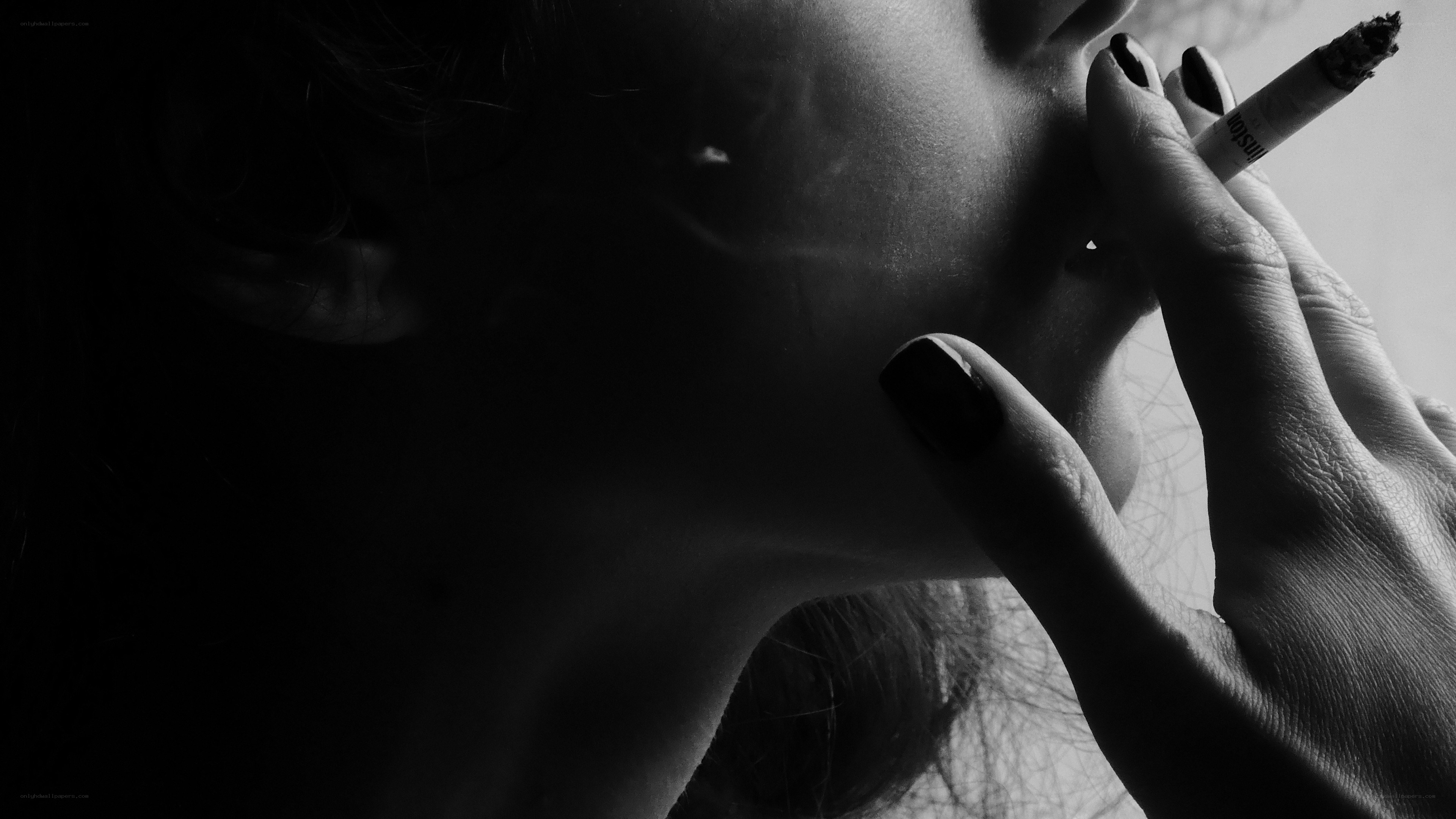 person smoking a cigarette