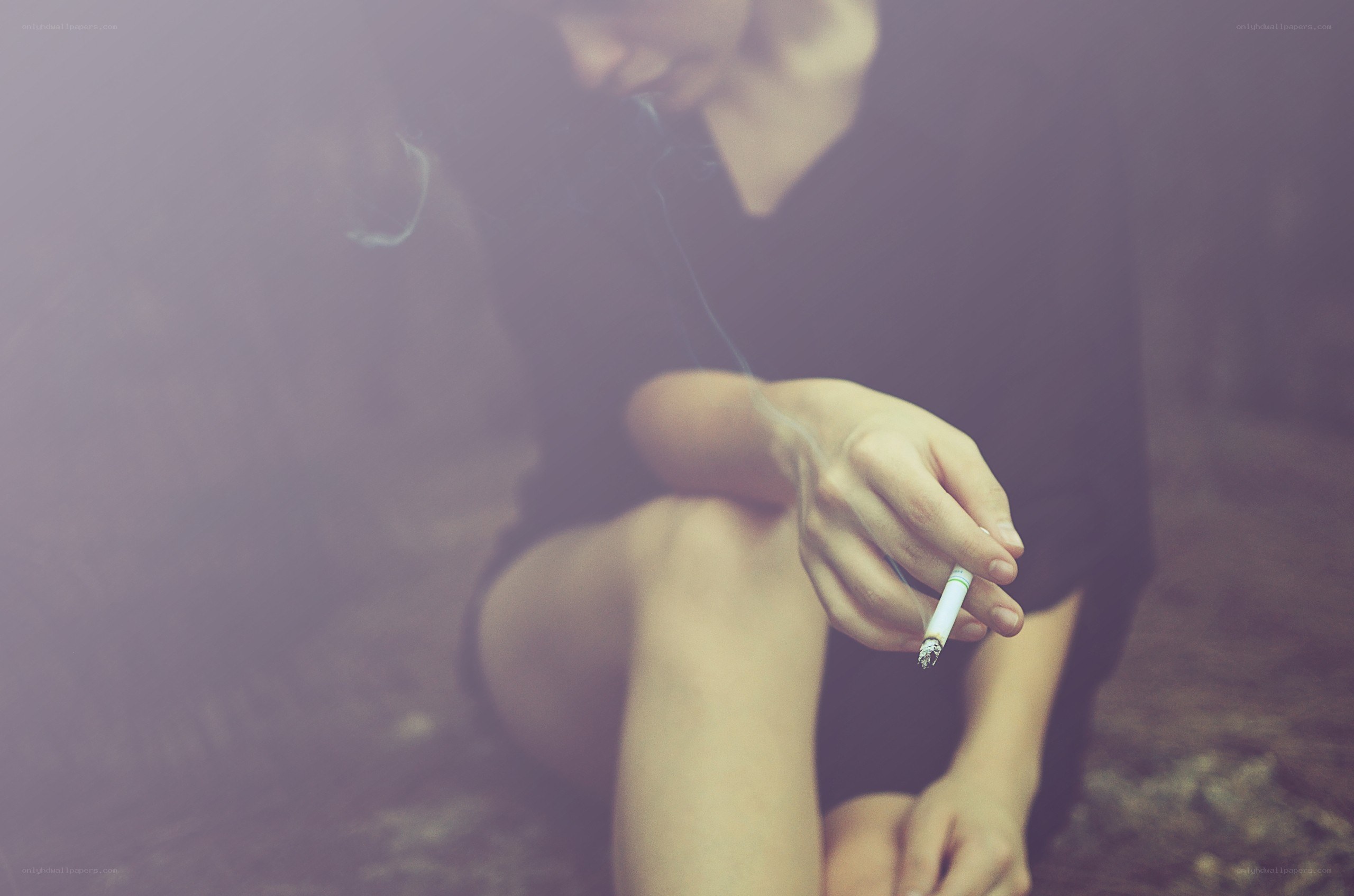 person smoking a cigarette