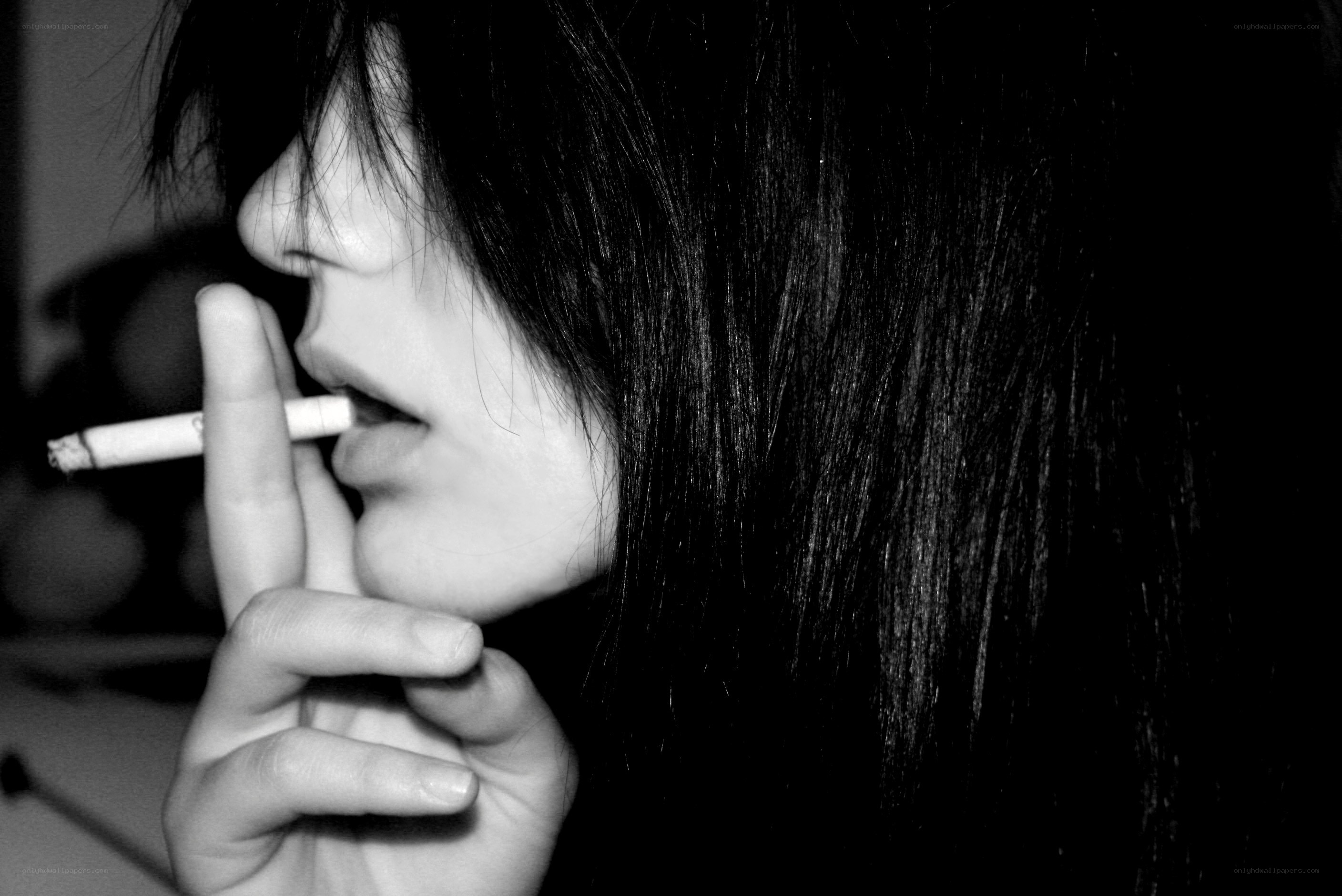 person smoking a cigarette
