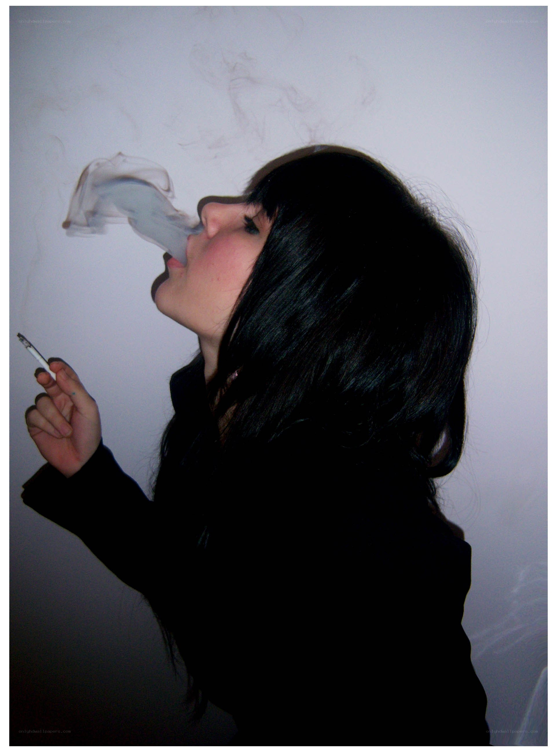 person smoking a cigarette