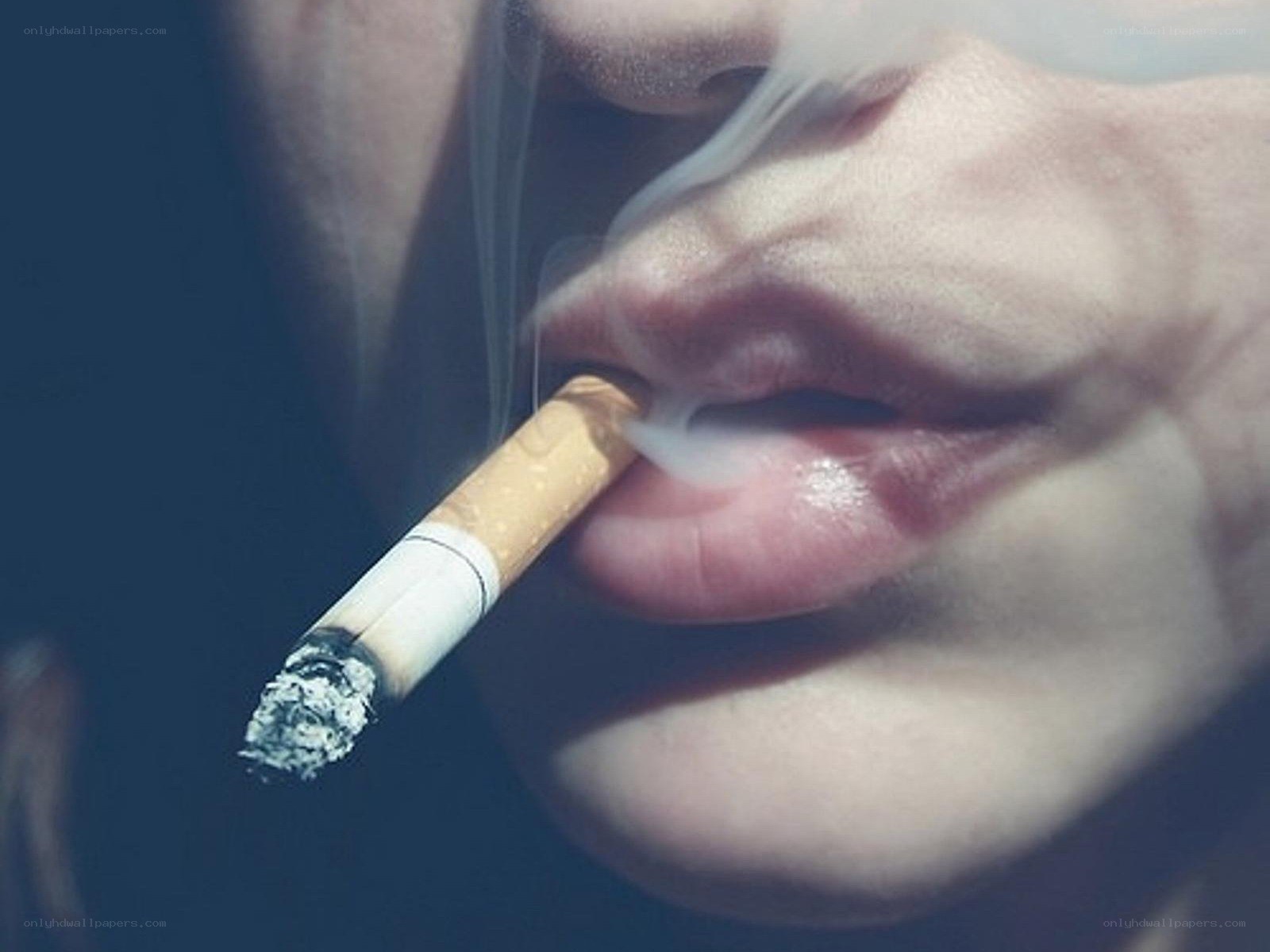 person smoking a cigarette