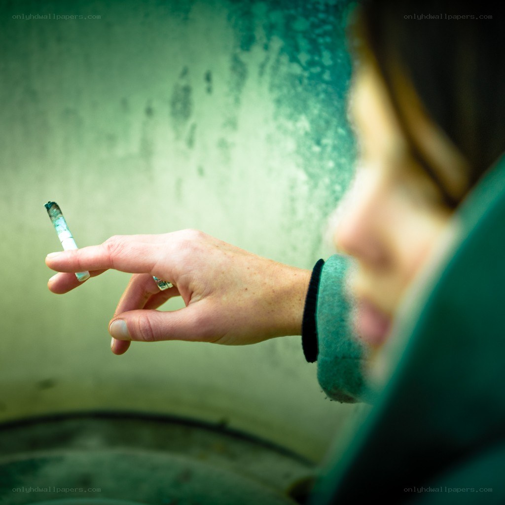 person smoking a cigarette