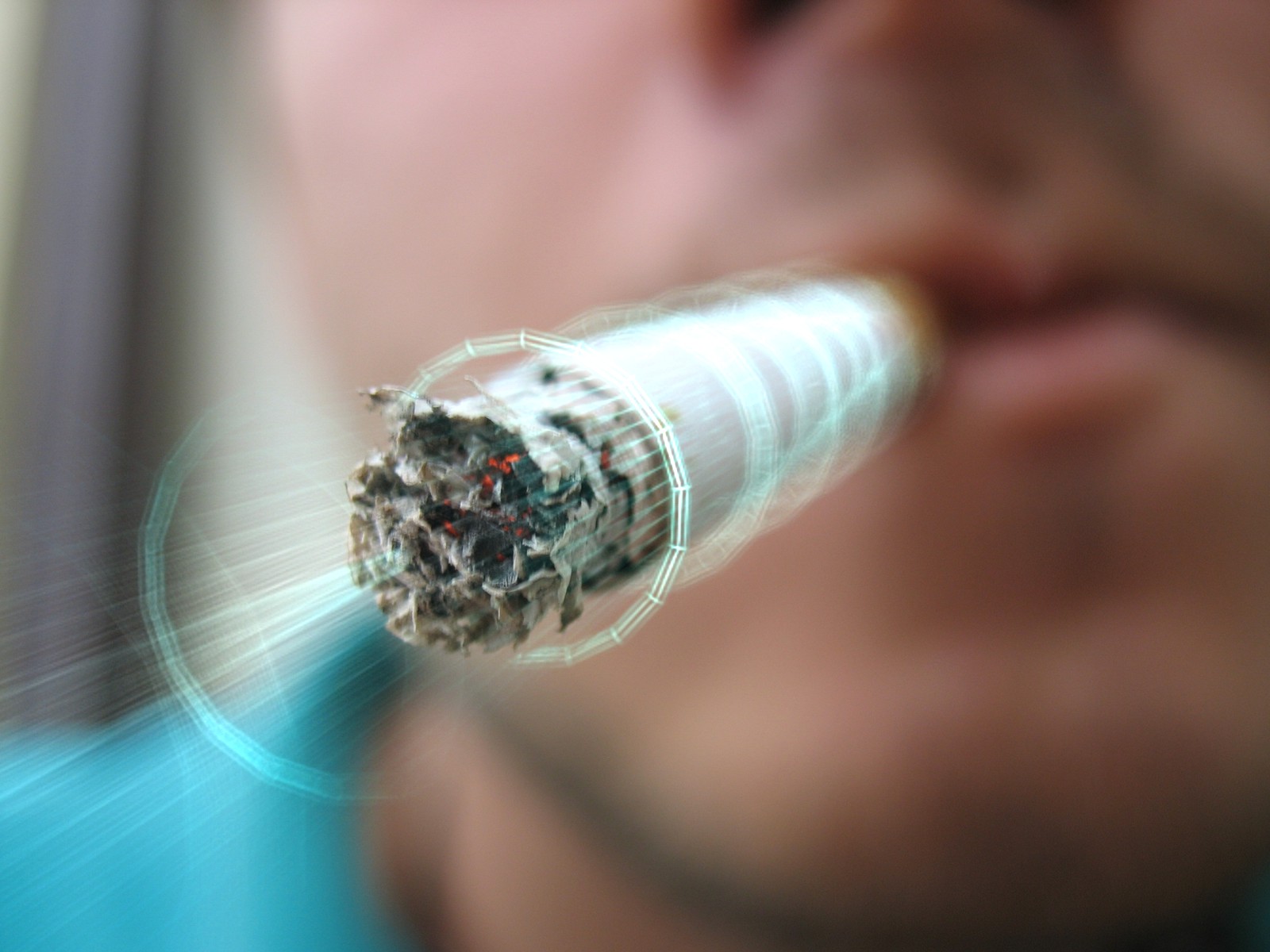 person smoking a cigarette