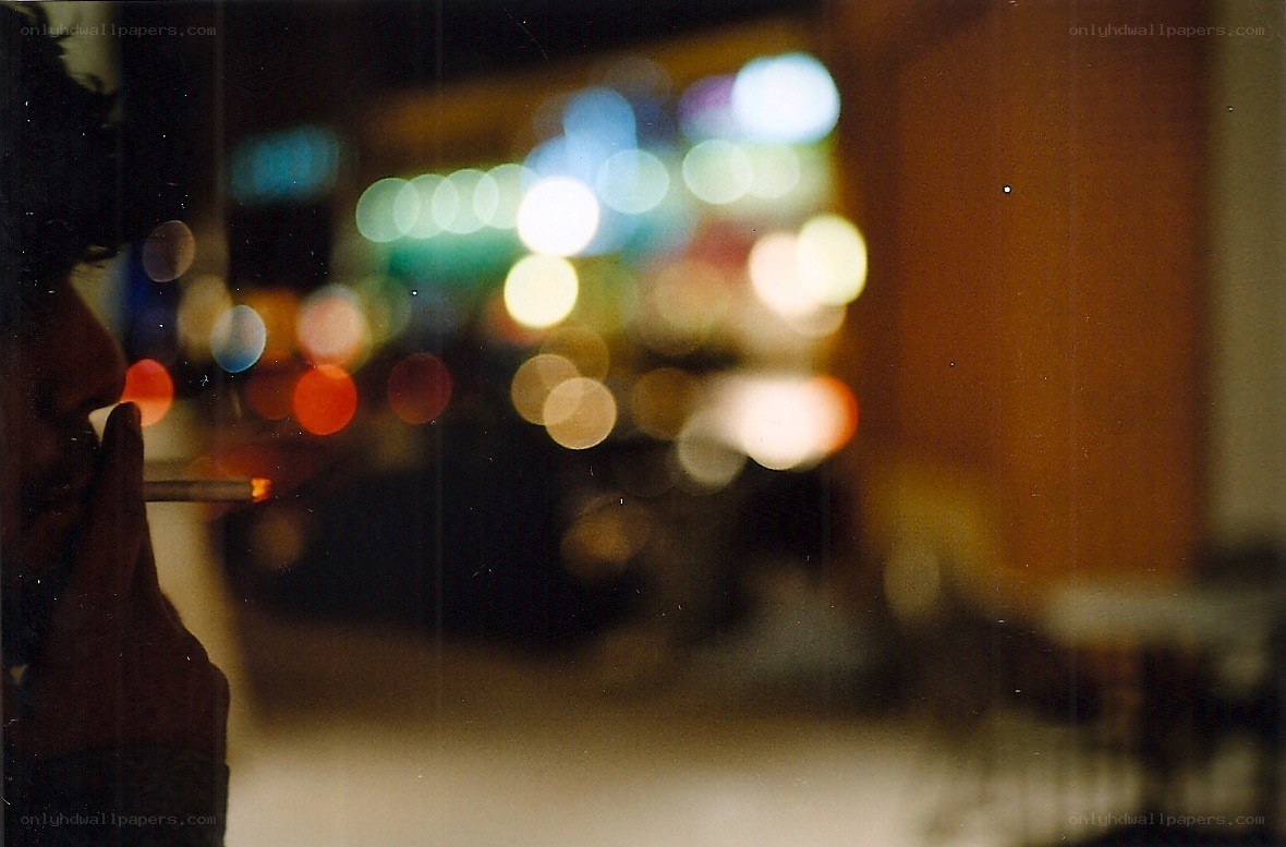 person smoking at night