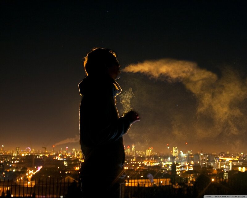 Person smoking at night