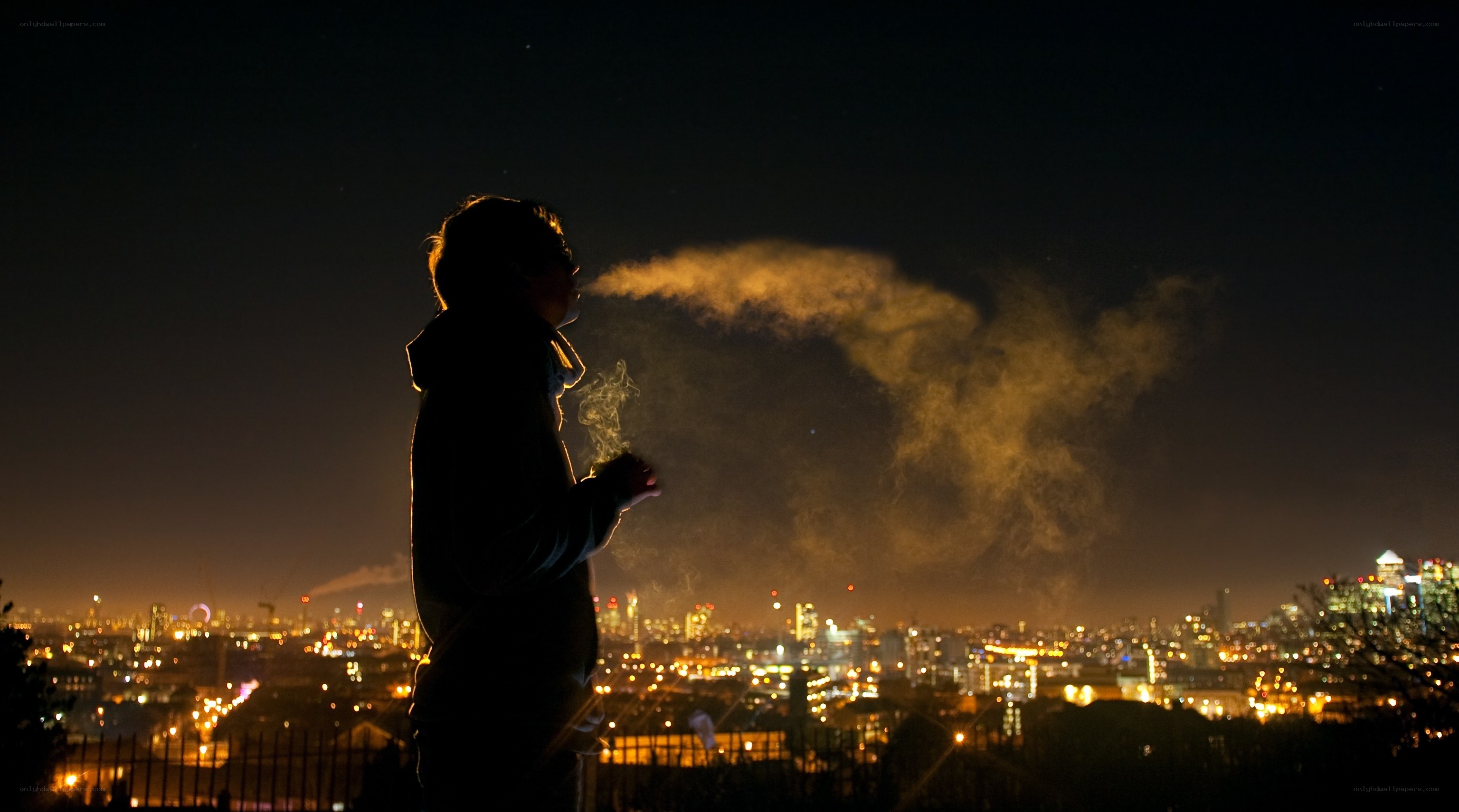 person smoking at night