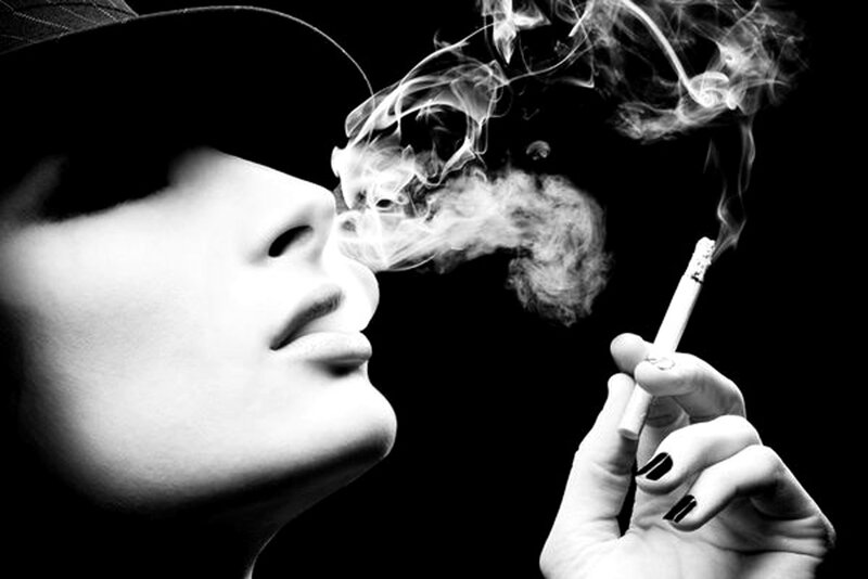 Person Smoking Cigarette — Black, Dramatic
