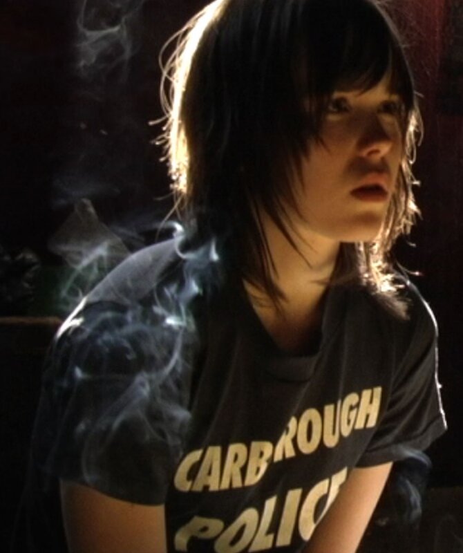 person smoking in dim light