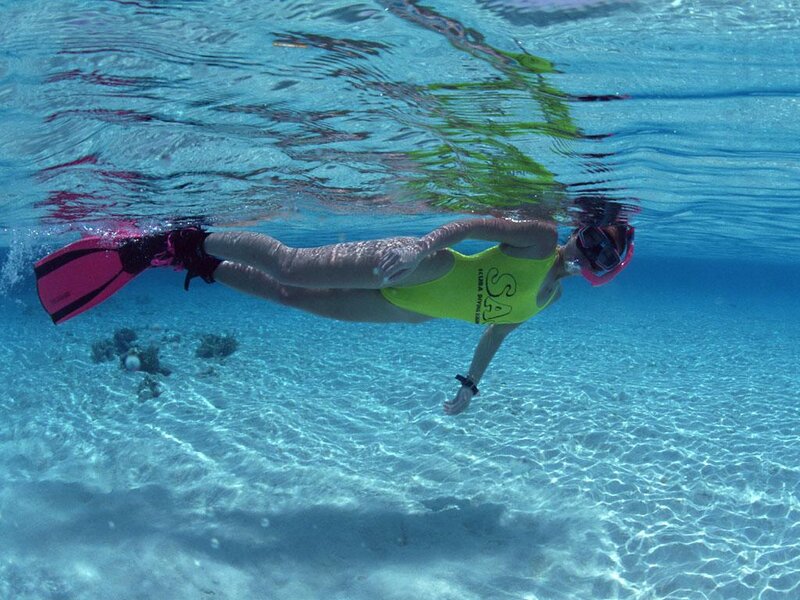 Person Snorkeling Underwater — Blue, Calm