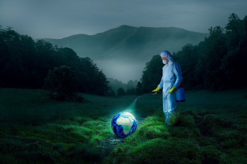 Person Spraying Globe