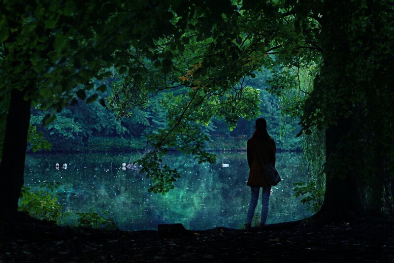 Person Standing by Lake — Green, Serene
