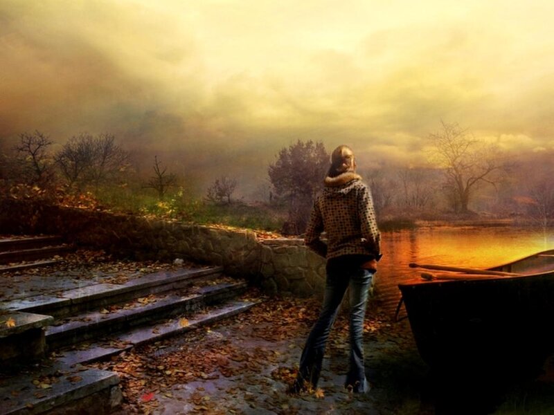 Person Standing by River