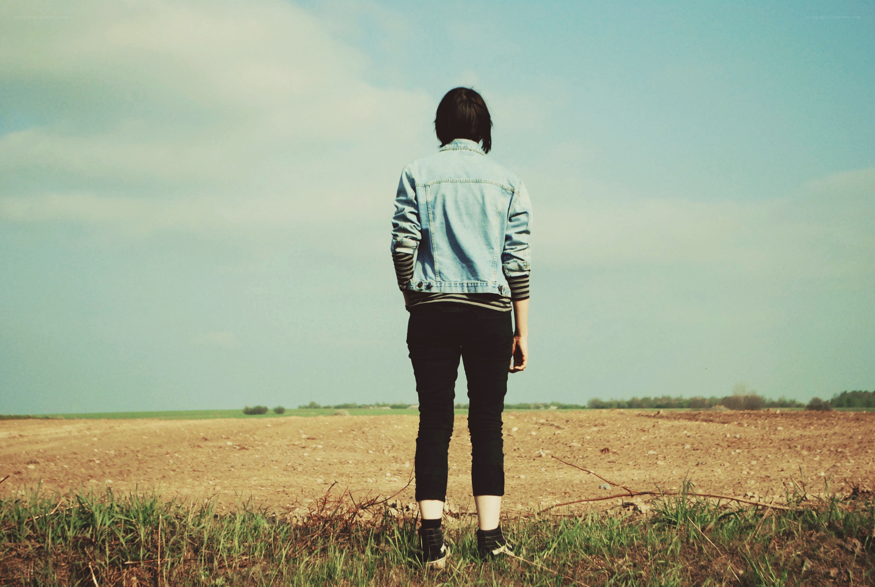 person standing in a field