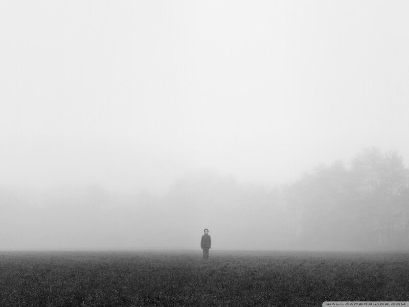 Person Standing in Field — Black
