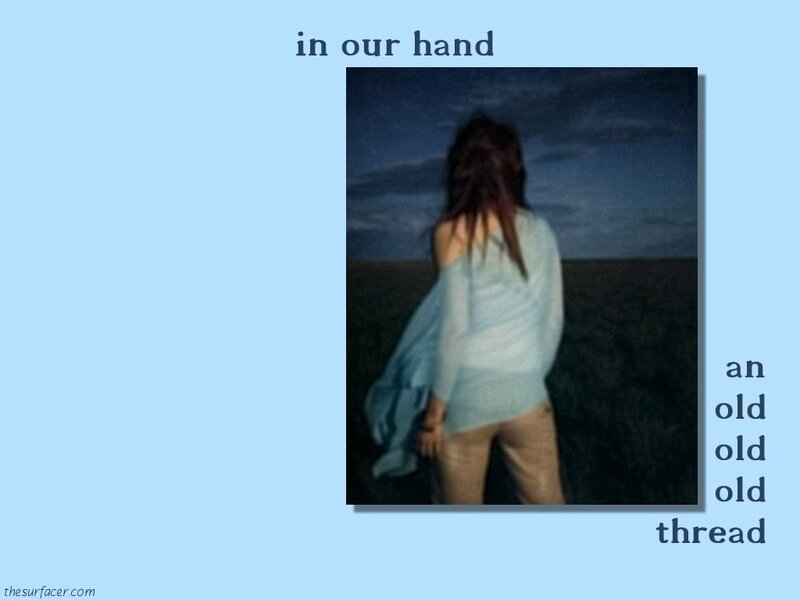 Person Standing in Field — Blue