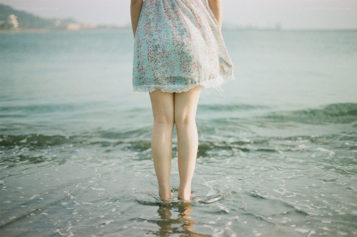 person standing in ocean