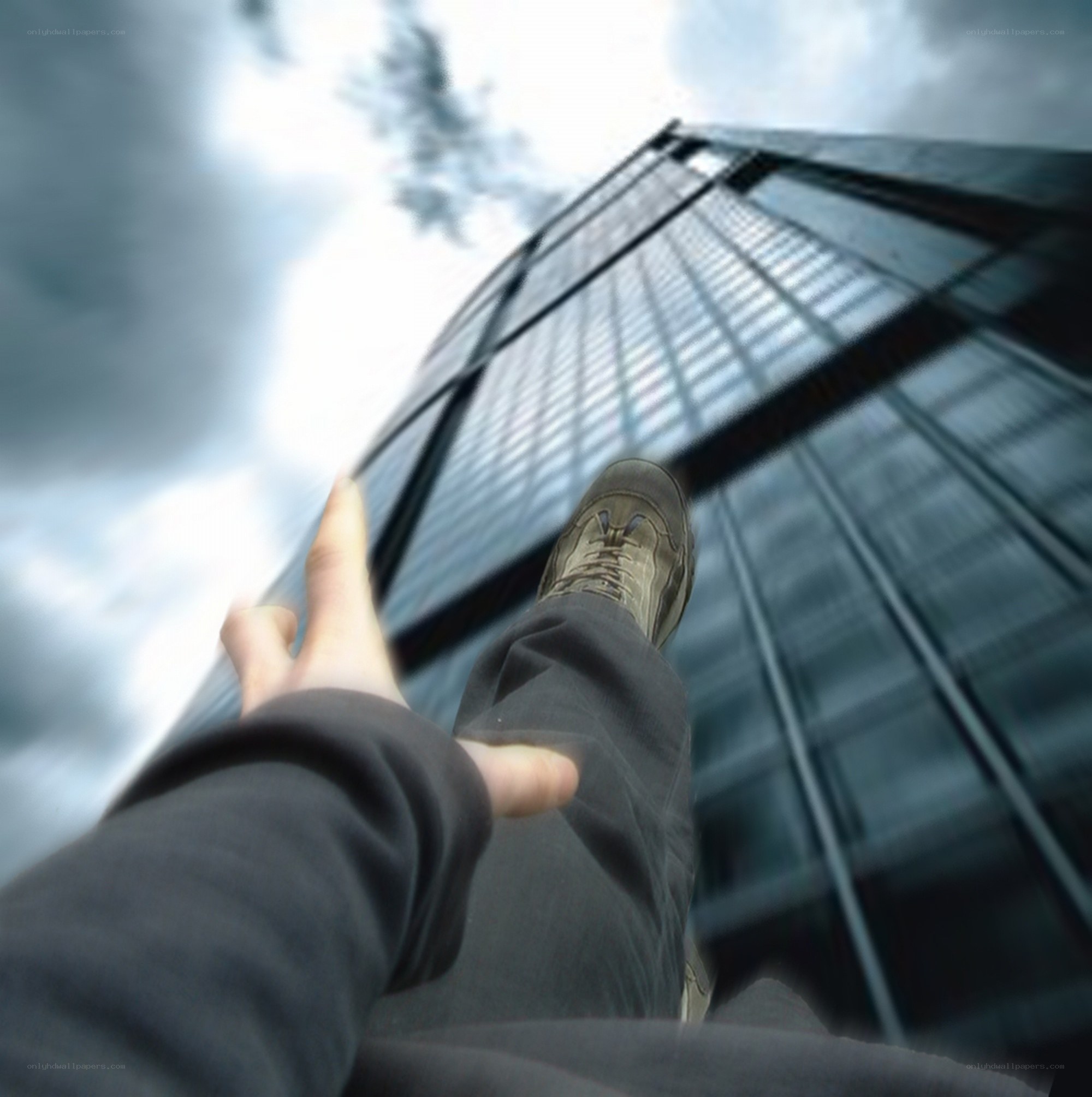 person standing near skyscraper
