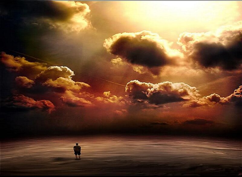 Person standing on a vast plain