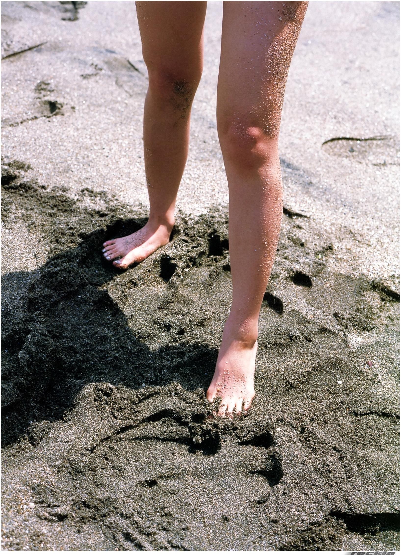person standing on beach