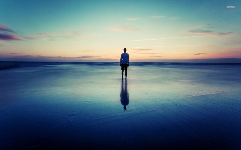 Person Standing on Beach — Blue, Serene, Sunset, Photograph