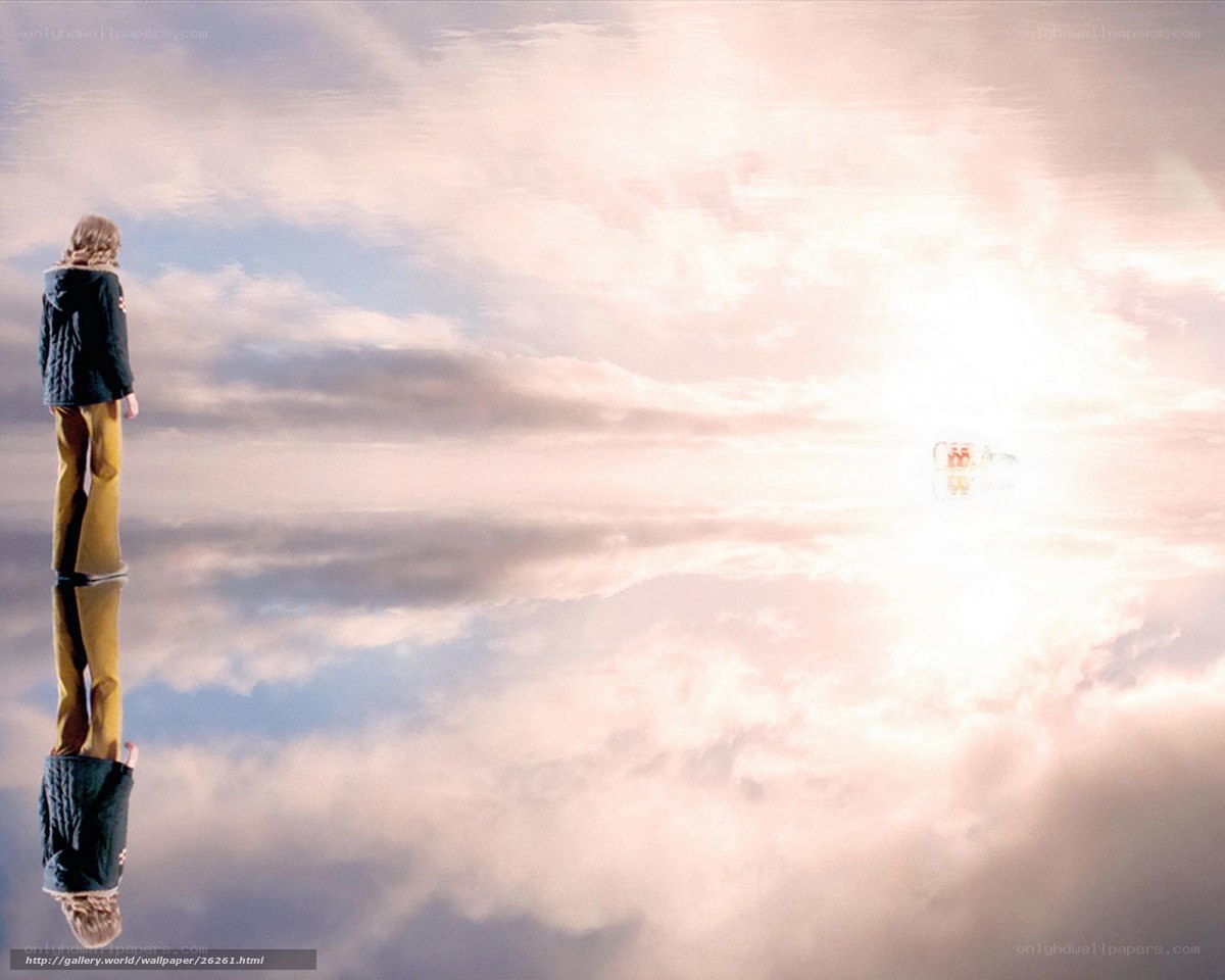 Person standing on clouds