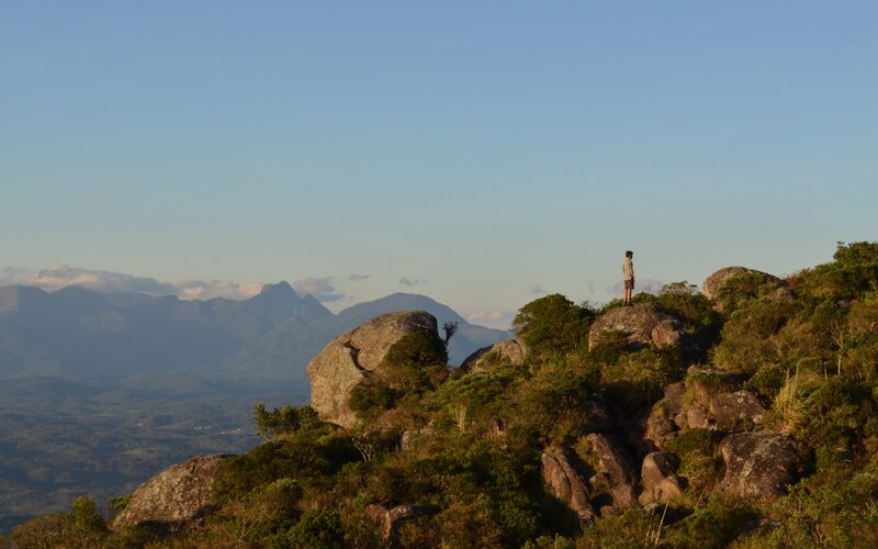 Person Standing on Rock — Blue, Serene