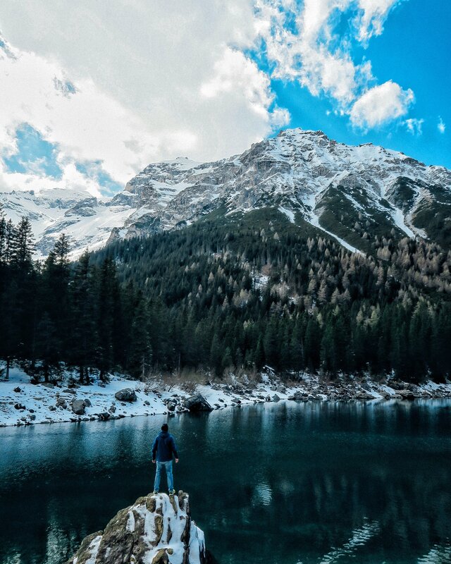 Person Standing on Rock — Blue, Serene, Winter