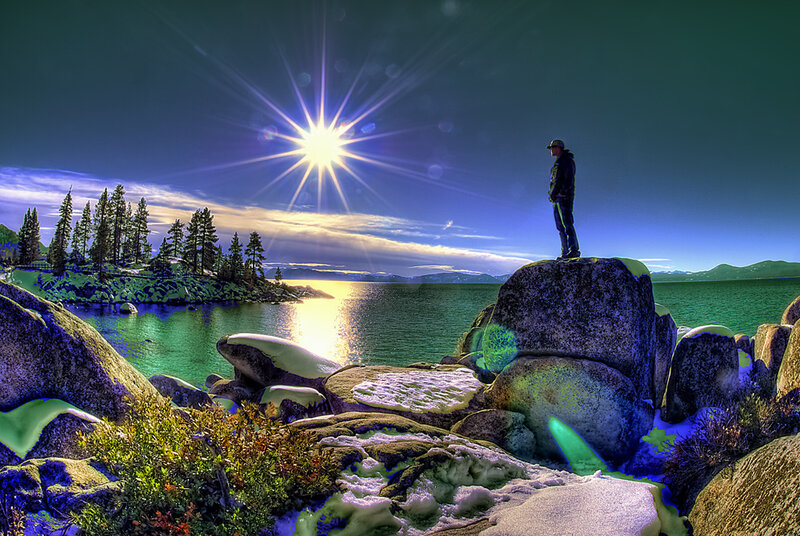 Person Standing on Rock